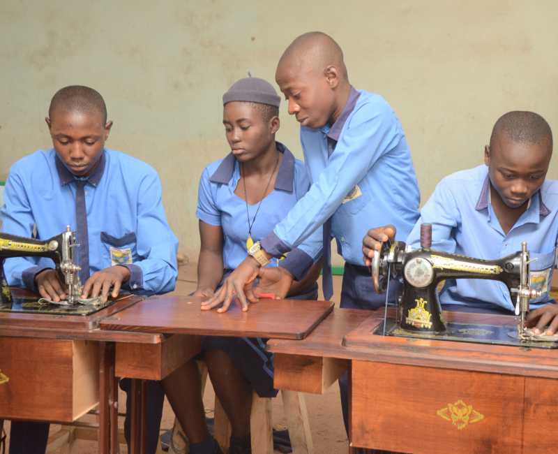 St. Jude's Students in Tailoring Practical Class
